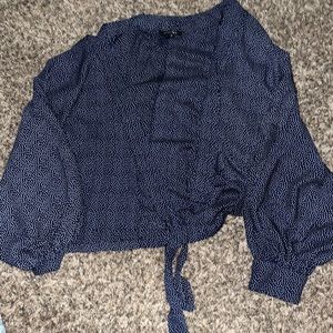 Blue and white polka dot blouse
